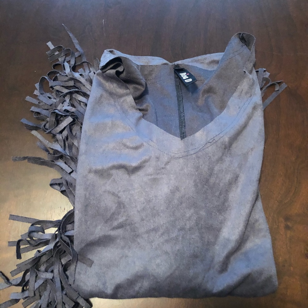 Diva D. Gray fringe shirt.